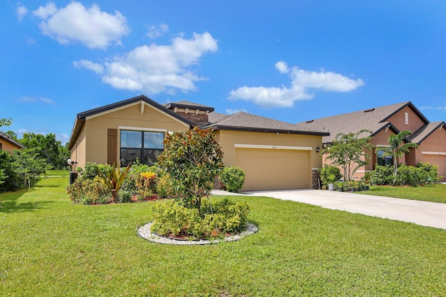 view of front of property with a front lawn and a garage