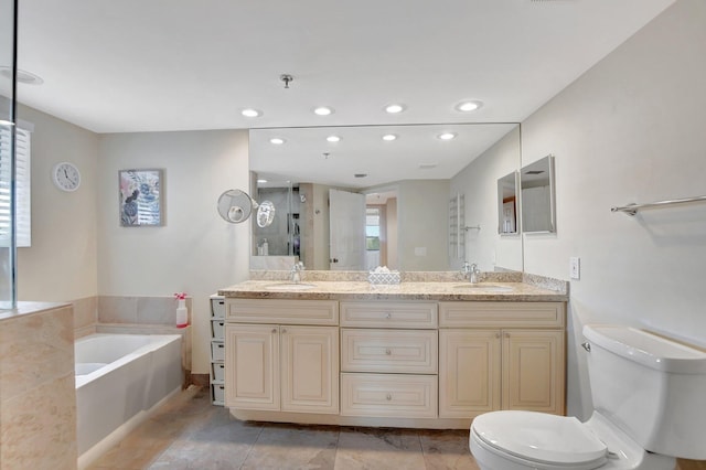 full bathroom featuring vanity, toilet, independent shower and bath, and tile patterned flooring