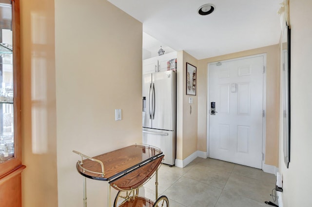 interior space with light tile patterned flooring