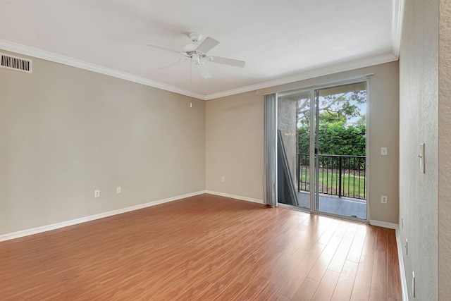 unfurnished room with crown molding, hardwood / wood-style flooring, and ceiling fan