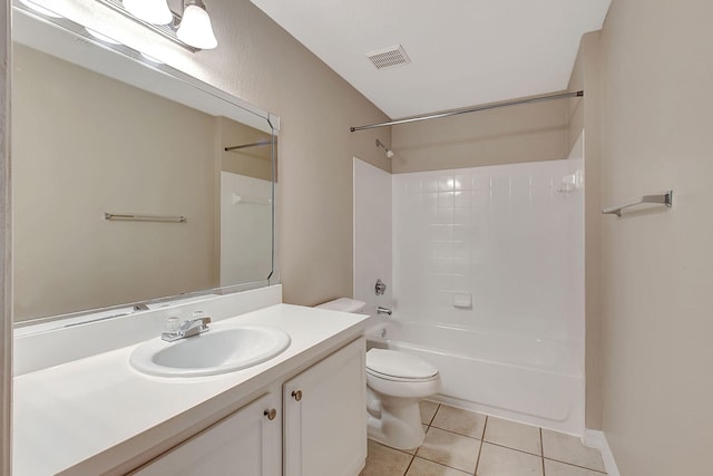 full bathroom featuring vanity, tile patterned floors, washtub / shower combination, and toilet