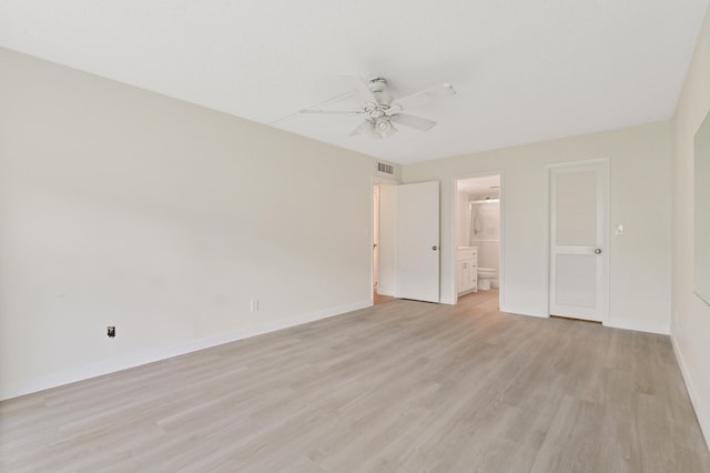 unfurnished bedroom featuring ensuite bathroom, ceiling fan, and light hardwood / wood-style floors