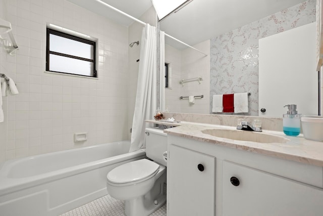 full bathroom with tile patterned floors, vanity, toilet, and shower / bath combo