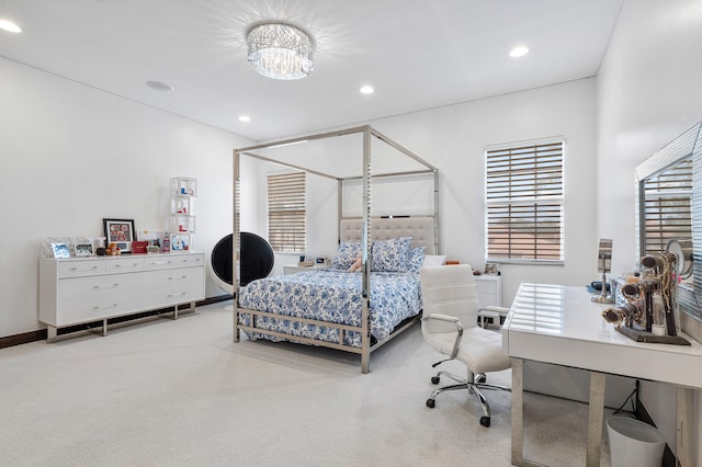 bedroom featuring light colored carpet