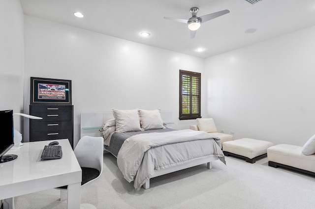 carpeted bedroom featuring ceiling fan