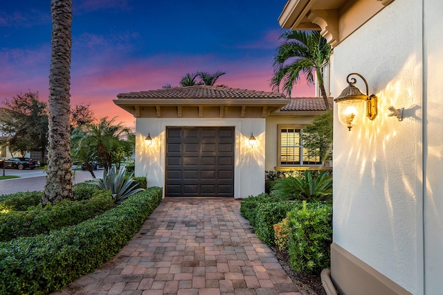 exterior space featuring a garage