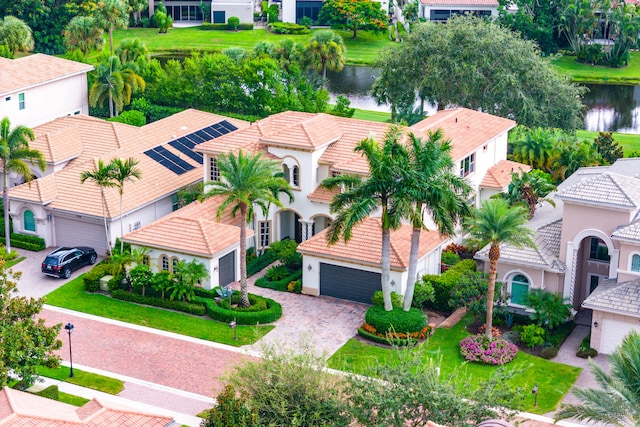 bird's eye view with a water view