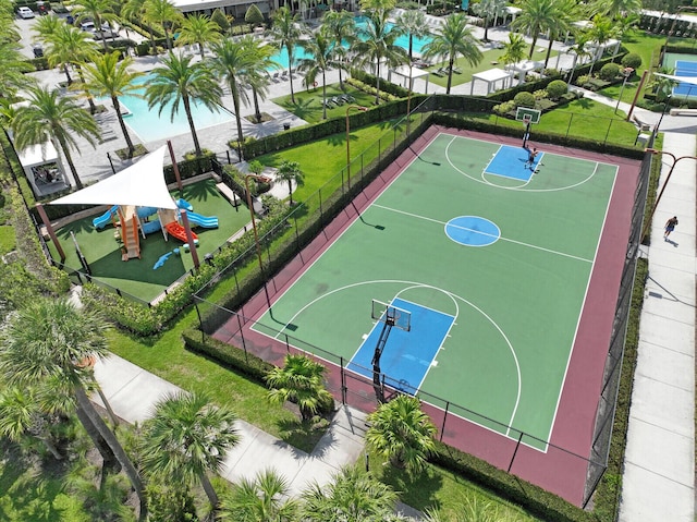 view of sport court with a playground and tennis court