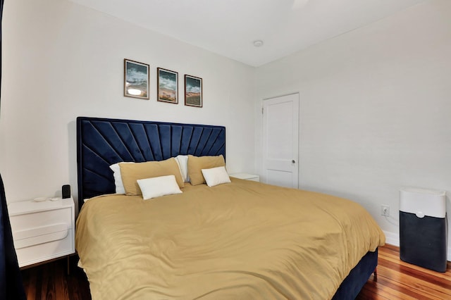 bedroom with wood-type flooring