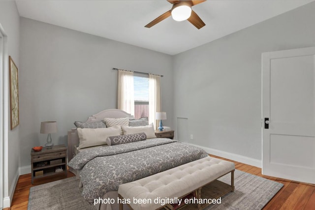 bedroom with ceiling fan and light wood-type flooring