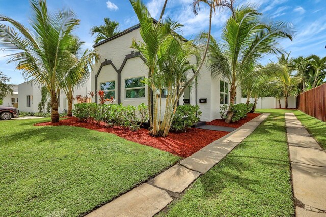 view of home's exterior with a lawn