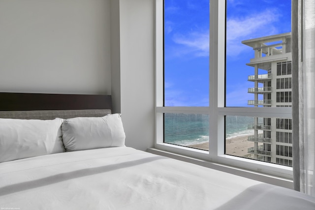 unfurnished bedroom with a water view