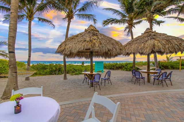 patio terrace at dusk with a water view