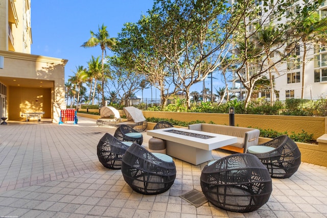 view of patio / terrace featuring a fire pit