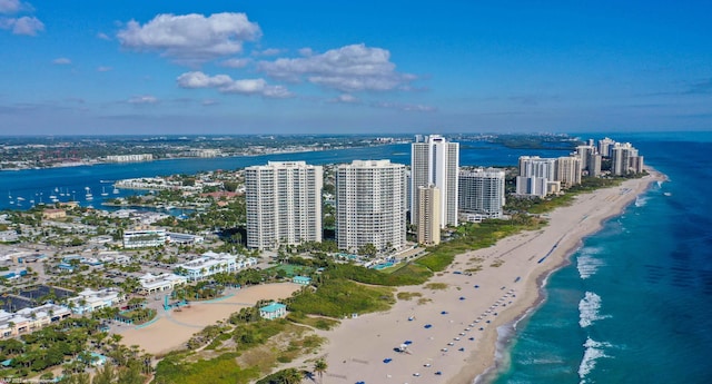 bird's eye view with a water view and a view of the beach