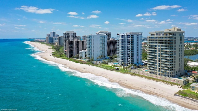 bird's eye view with a view of the beach and a water view