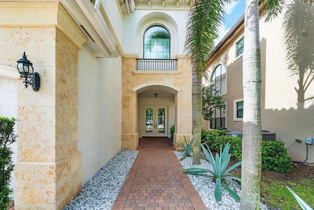 doorway to property with french doors