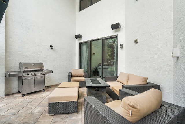 view of patio / terrace featuring an outdoor living space and grilling area