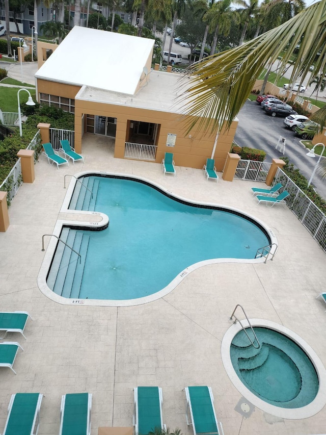 view of swimming pool featuring a patio