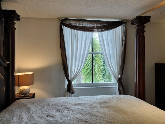 bedroom featuring a textured ceiling