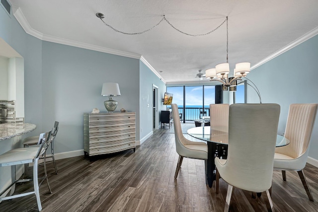 dining area with crown molding, floor to ceiling windows, a chandelier, and dark hardwood / wood-style flooring