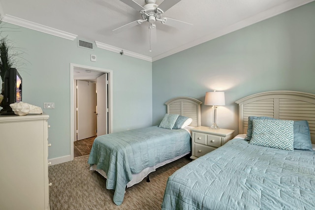 bedroom featuring ceiling fan, ornamental molding, and carpet