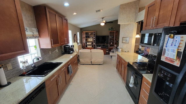 kitchen featuring black appliances, ceiling fan, sink, lofted ceiling, and backsplash