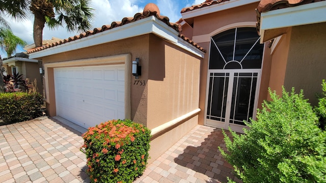 exterior space featuring a garage