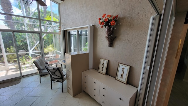 dining area featuring light tile patterned floors and ceiling fan