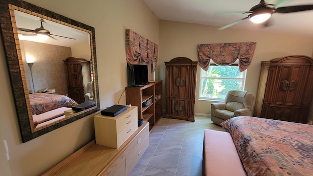 bedroom with light tile patterned floors and ceiling fan