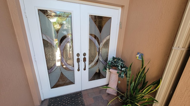 doorway to property featuring french doors