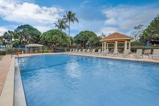 view of swimming pool featuring a gazebo