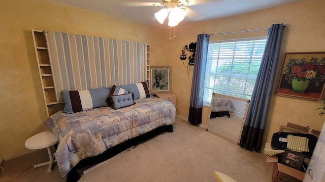 bedroom featuring carpet flooring and ceiling fan