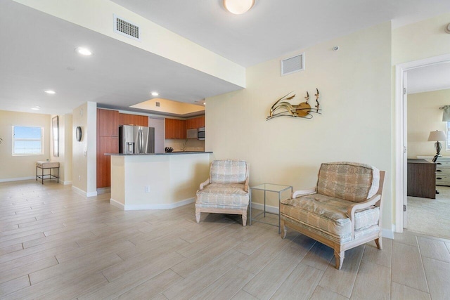 living area with light wood-type flooring