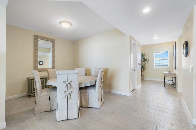 dining space featuring light hardwood / wood-style floors