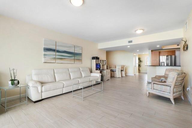 living room featuring light wood-type flooring