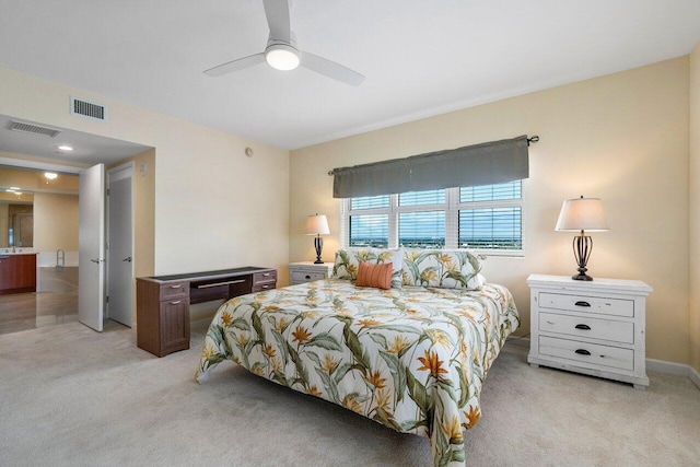 bedroom featuring ceiling fan and light colored carpet