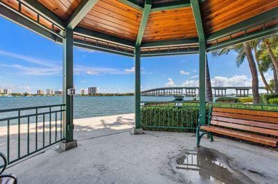 exterior space featuring a water view and a gazebo