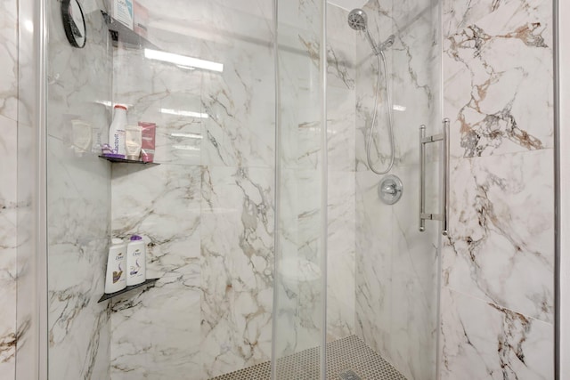 bathroom featuring an enclosed shower