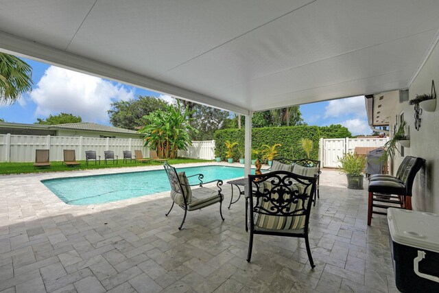 view of pool with a patio