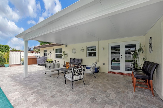 view of patio / terrace featuring french doors and a grill