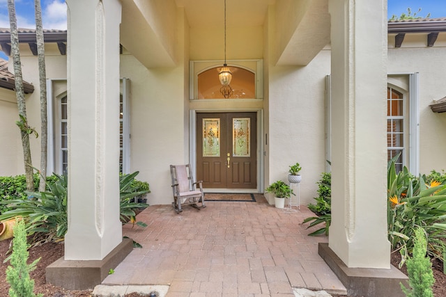 entrance to property featuring french doors