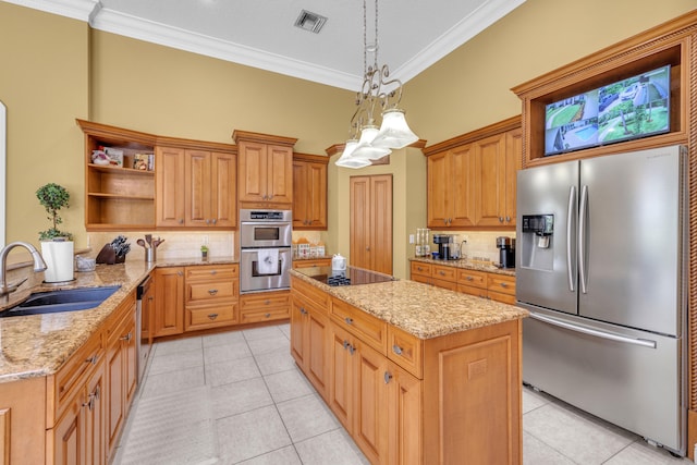 kitchen featuring light tile patterned flooring, sink, hanging light fixtures, ornamental molding, and stainless steel appliances