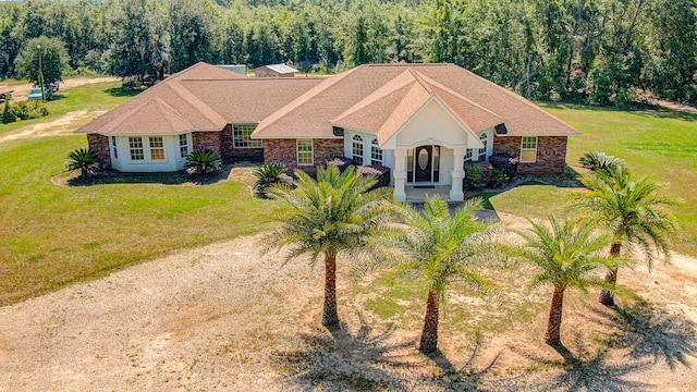 view of front of property with a front lawn