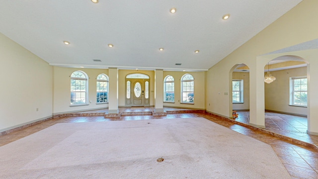 unfurnished living room featuring tile patterned floors