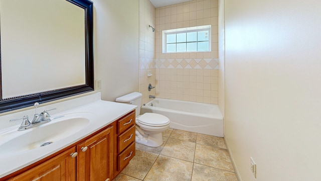 full bathroom with vanity, tiled shower / bath combo, toilet, and tile patterned floors