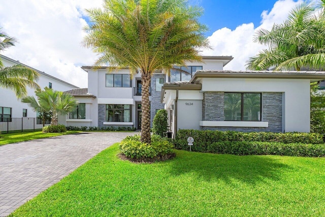 view of front of home with a front yard