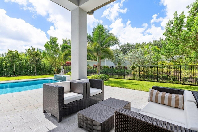 view of patio / terrace with a fenced in pool