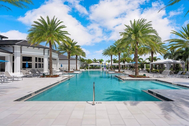 view of swimming pool featuring a patio area