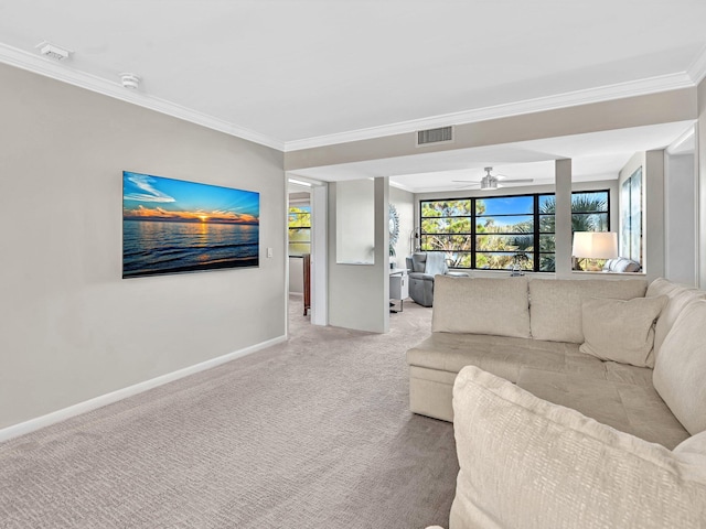 unfurnished living room with crown molding, light carpet, and ceiling fan